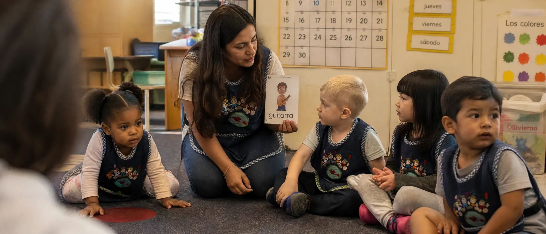 Children and their teacher in the TSIP classroom